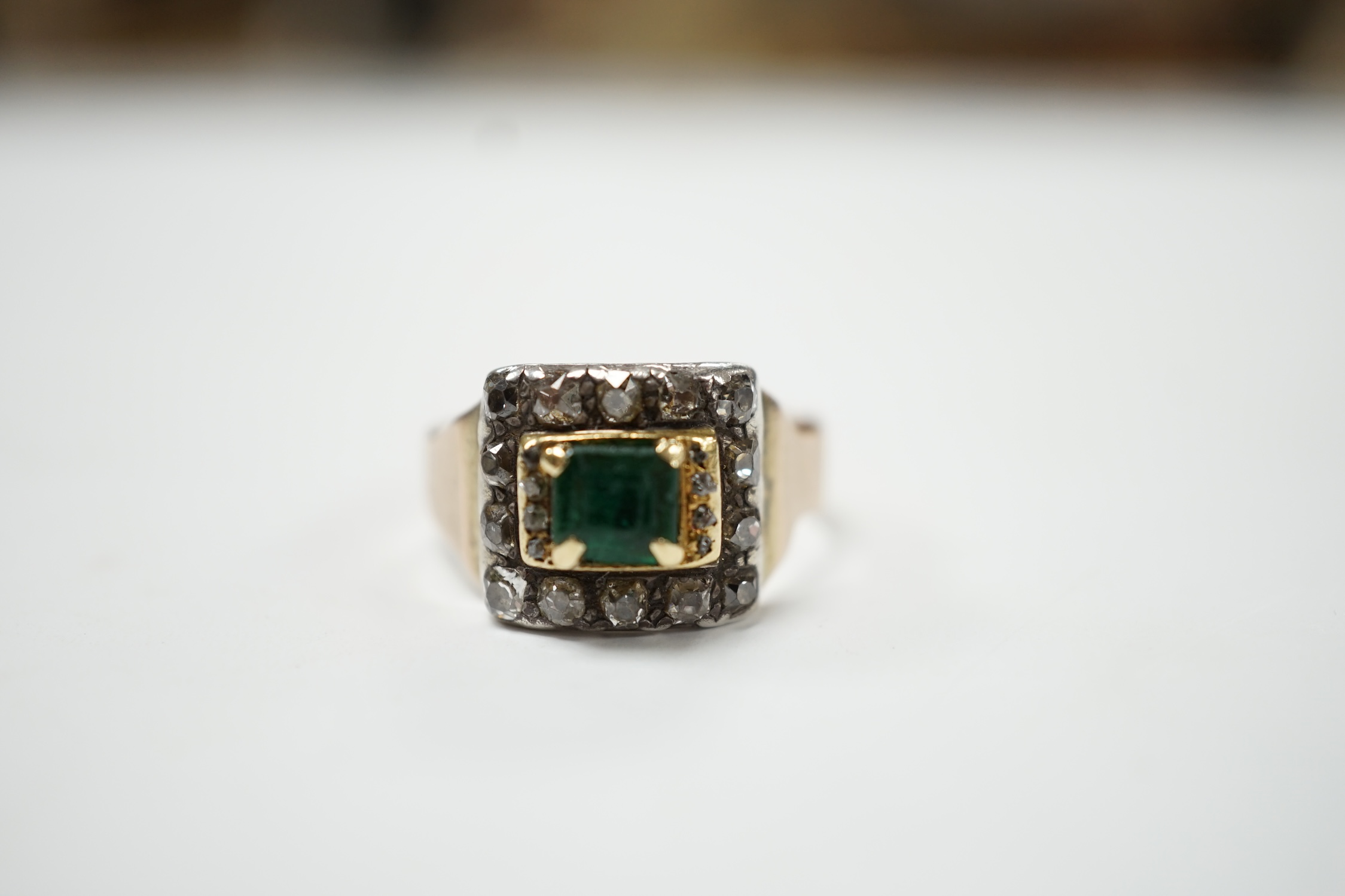 A George III 18ct, emerald and diamond cluster set mourning ring, with engraved inscription, 'H. Goodwin? died 18th Jan, 1790, aged 63', size S, gross weight 5.5 grams. Condition - fair